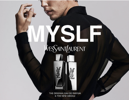 Yves Saint Laurent perfume advertisement with a man holding a black shirt.